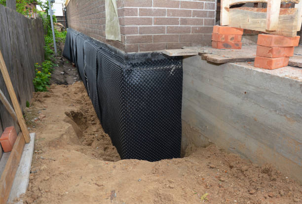 SJ Waterproofing Pros technician performing targeted Waterproofing assessment in Little Ferry, NJ